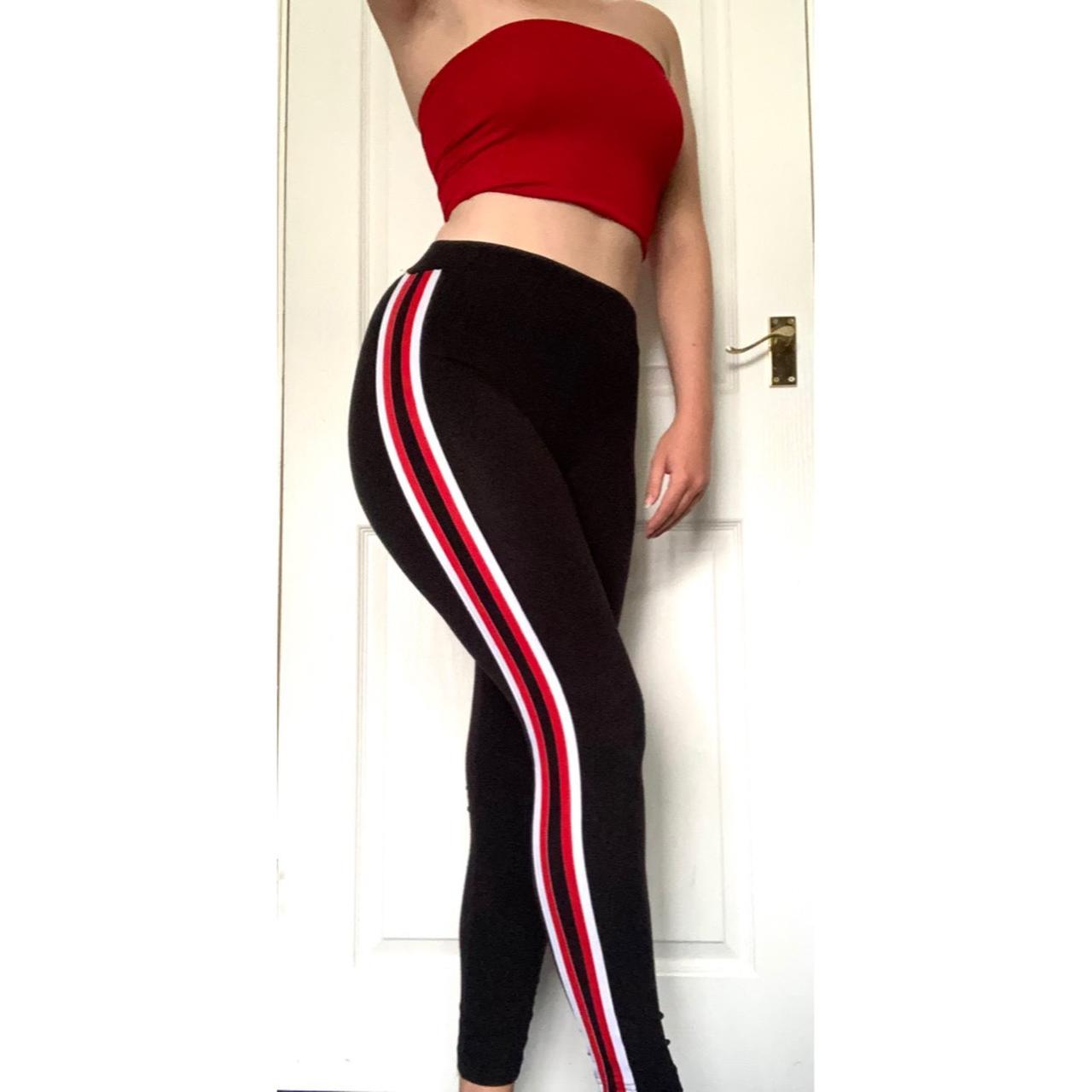 Black leggings with red 2024 stripe down the side