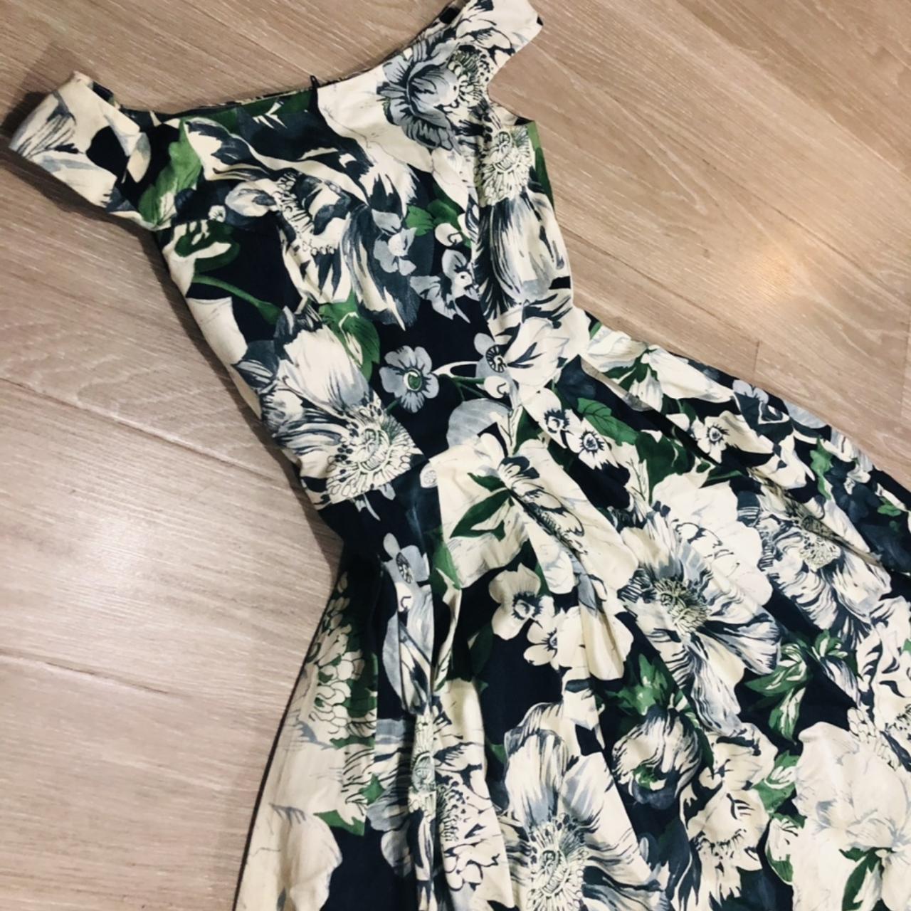 Stunning floral pin up style dress! This looks... - Depop