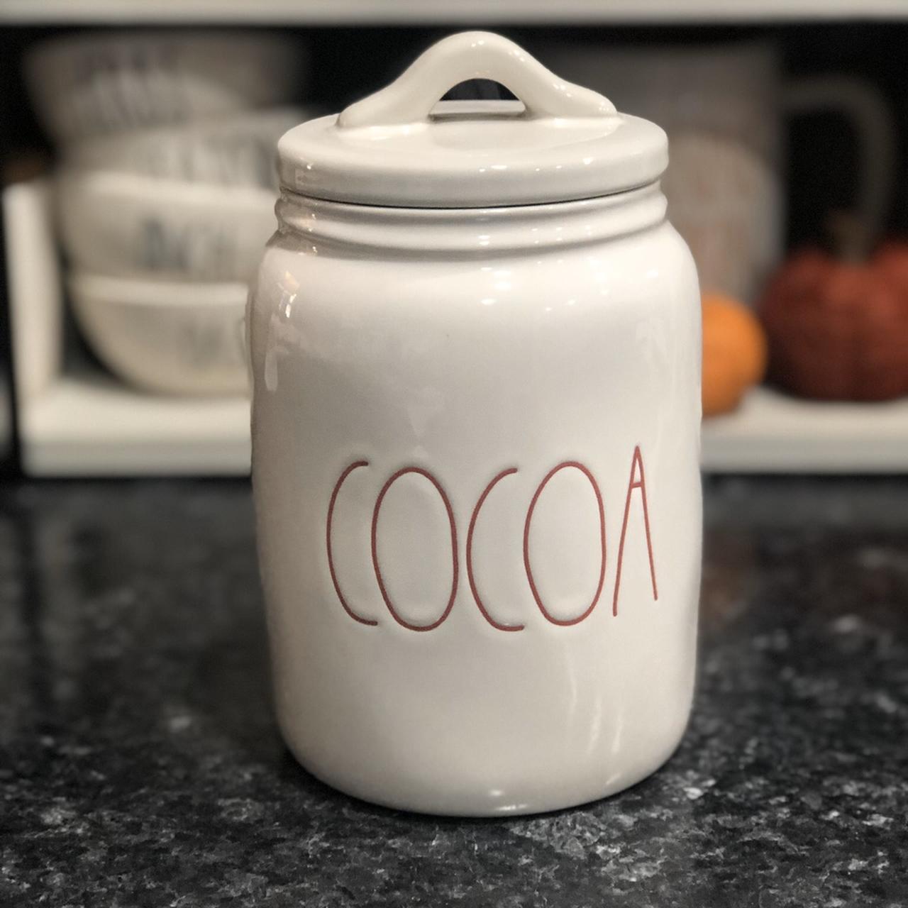 Rae purchases Dunn Cocoa Canister