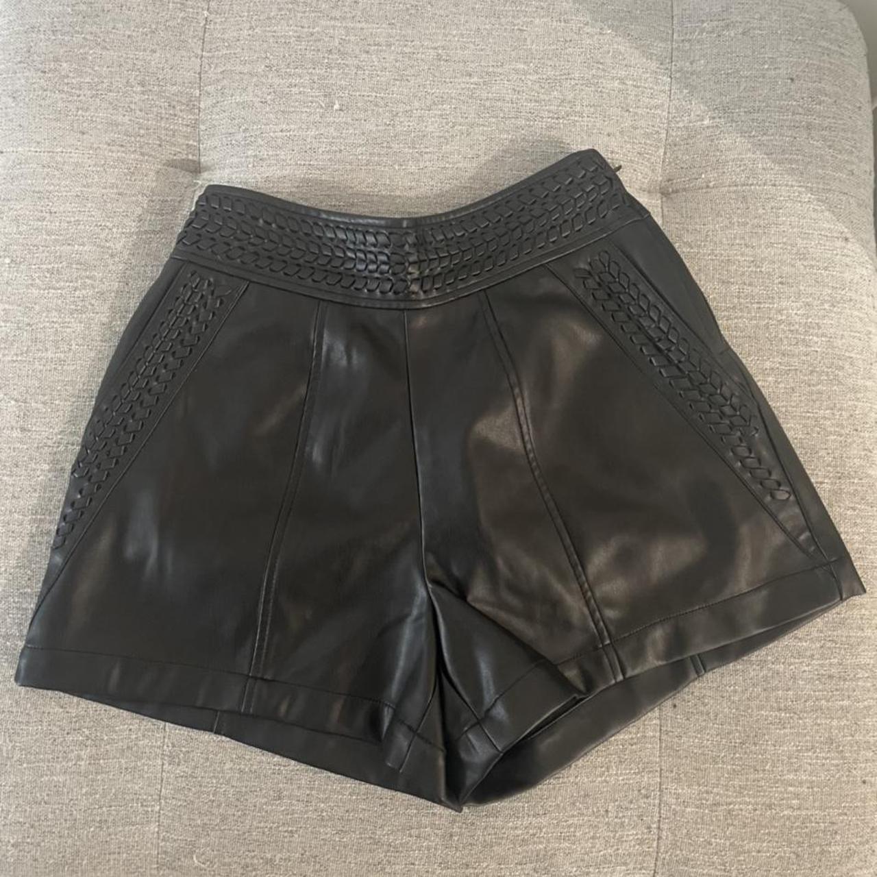 Black faux leather shorts from River Island size 8 - Depop