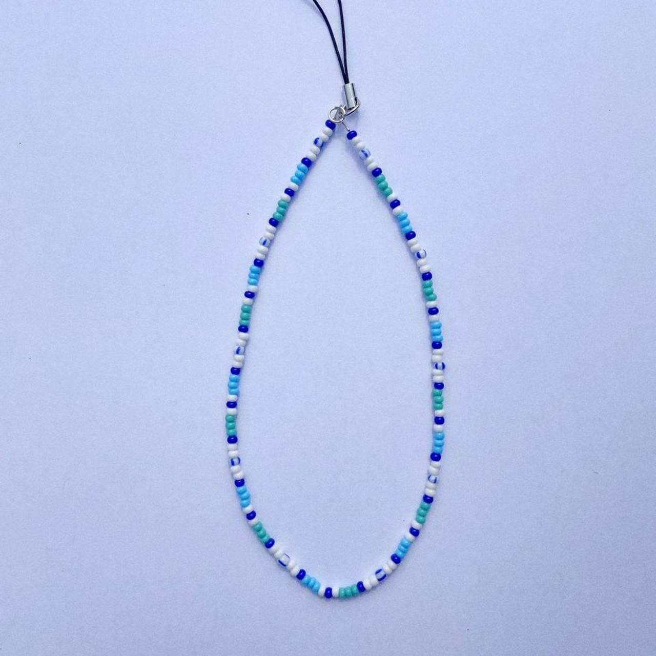 🐠 Multicoloured phone charm made with blue and white... Depop