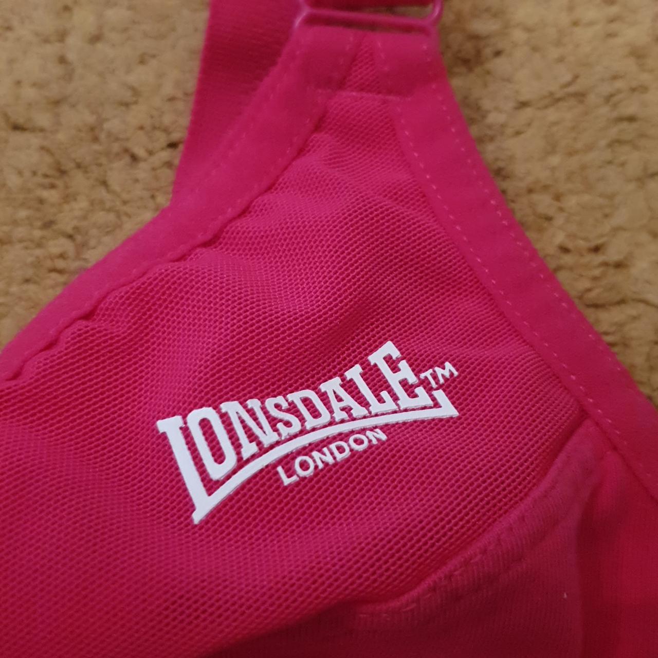 Pink and white Lonsdale sports bra 34D. Worn once. - Depop