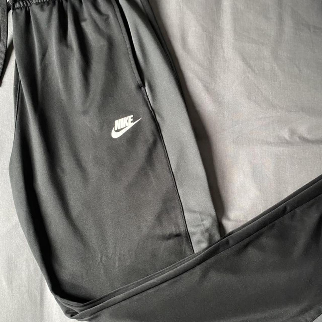 nike tribute poly tracksuit in black