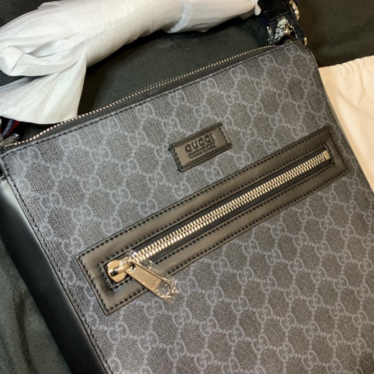 Gucci logo bag in black. Missing a tag on a zipper. - Depop