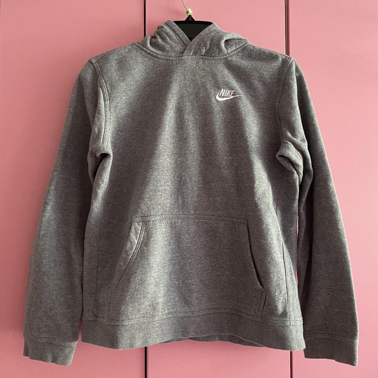 grey nike hoodie with pockets kids xl fits women’s... - Depop