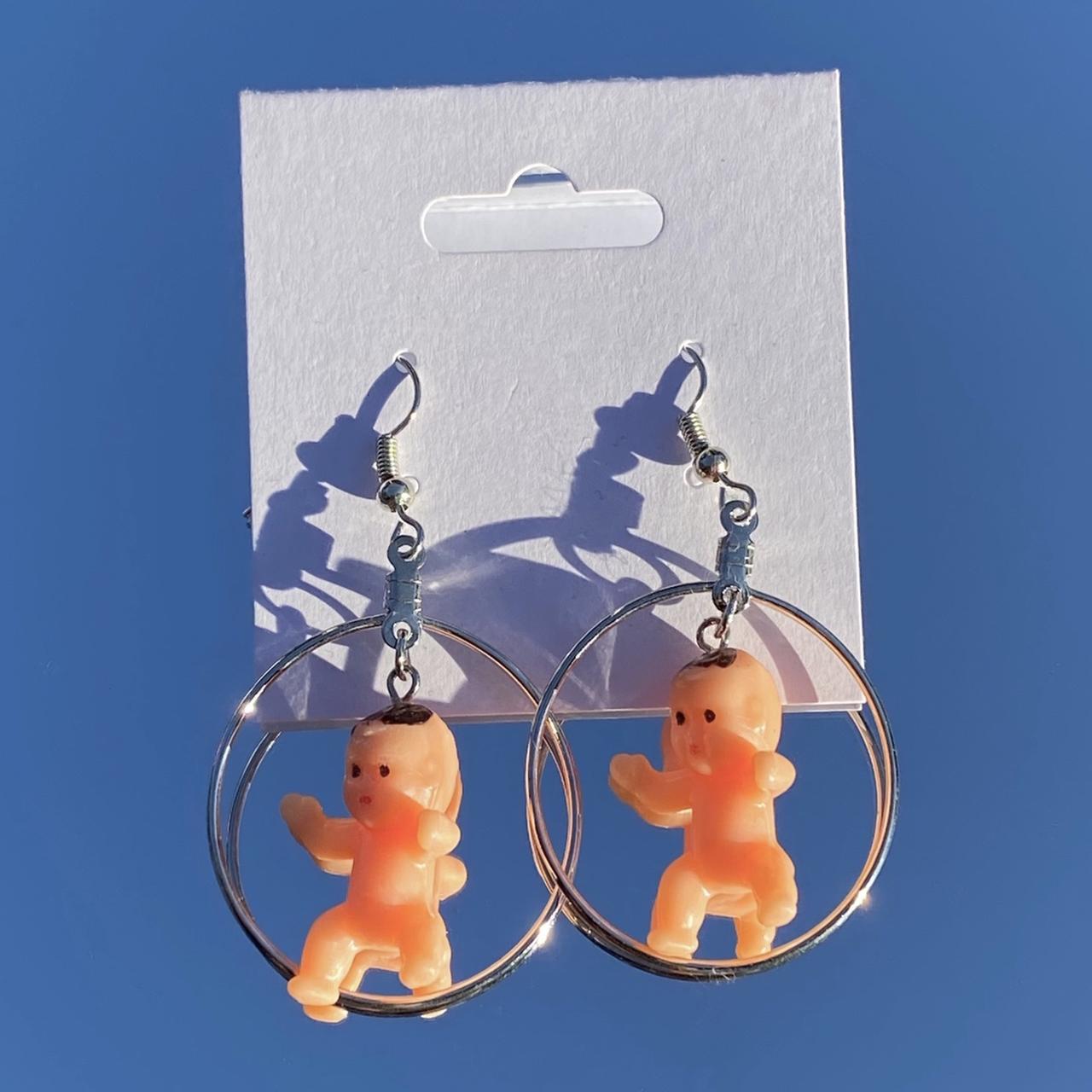 plastic baby hoop earrings! made these just for fun... Depop