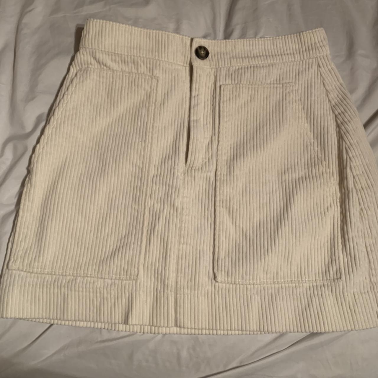 Corduroy cream skirt. Mid thigh length and has large... - Depop