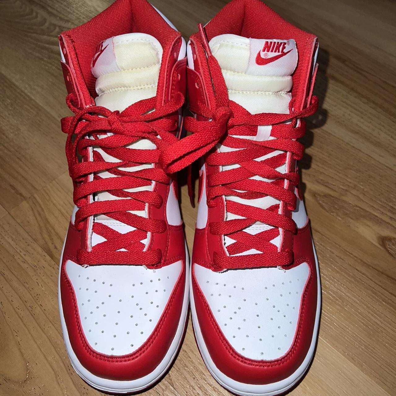 university red dunk on feet