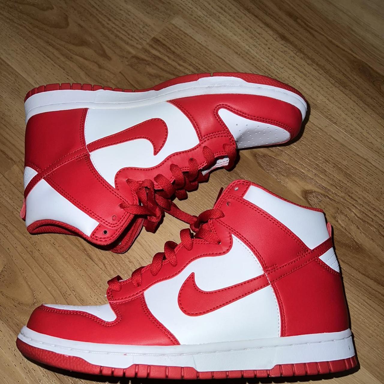 university red dunk on feet