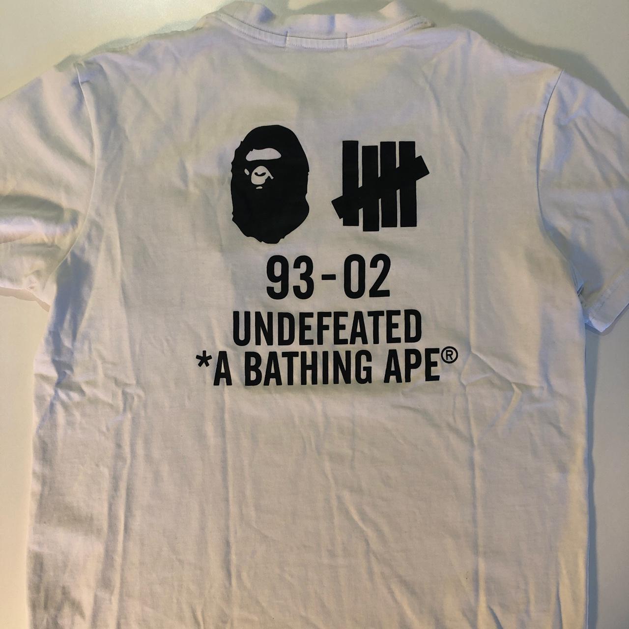 A Bathing Ape x Undefeated T-Shirt Size:M fits tight... - Depop