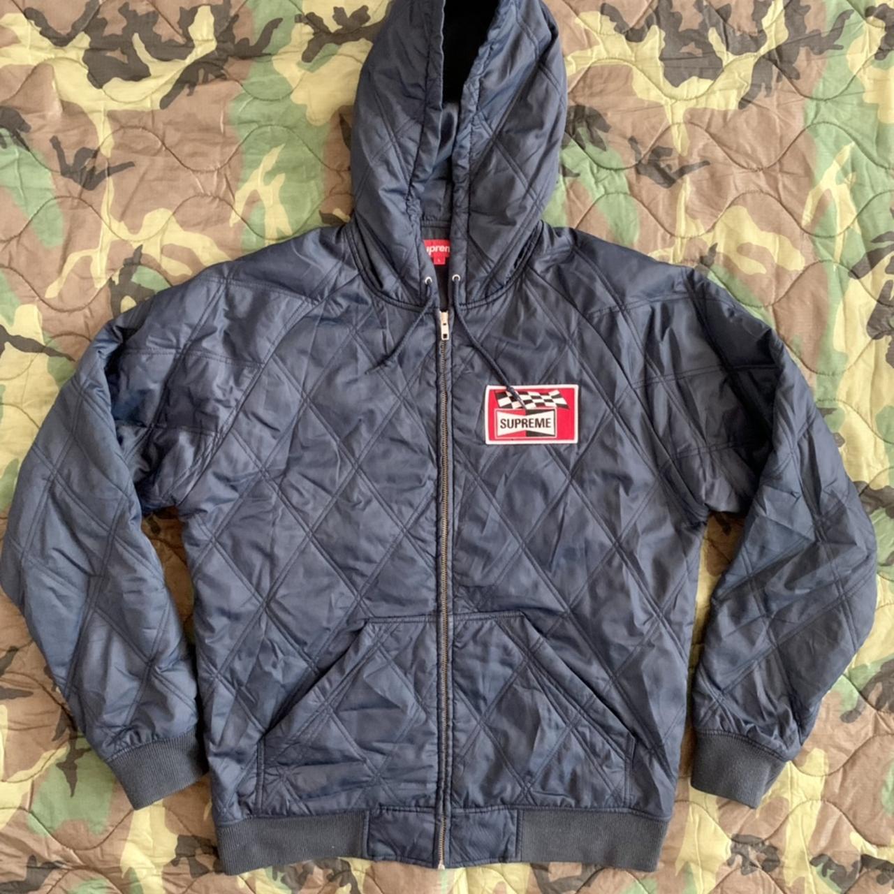 OFFICIAL SUPREME HOODED NYLON ZIP JACKET. GENTLY...