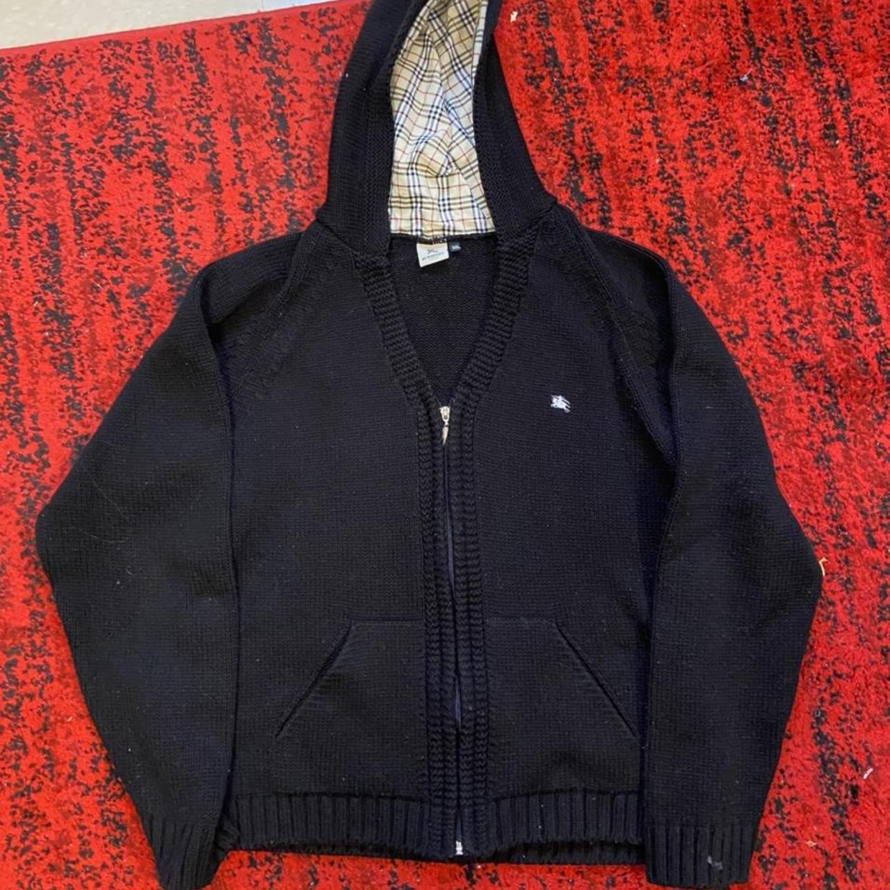 Burberry knit hoodie in black, listed as three XL,... - Depop
