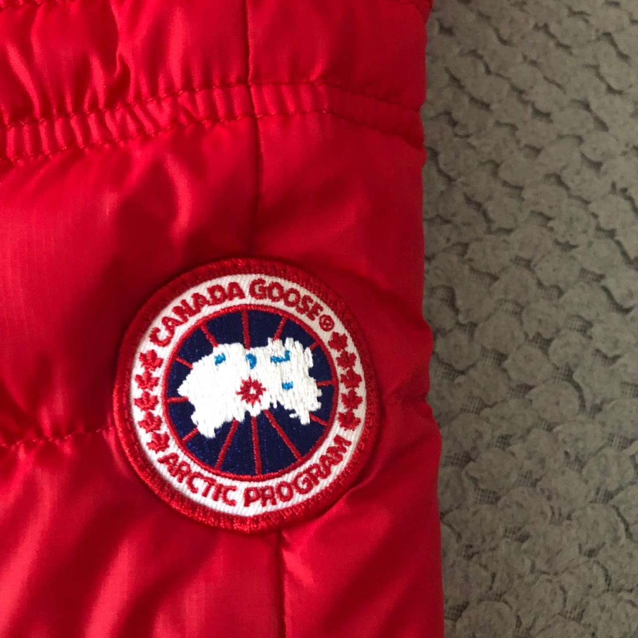 Red Canada goose coat good condition size L junior Depop