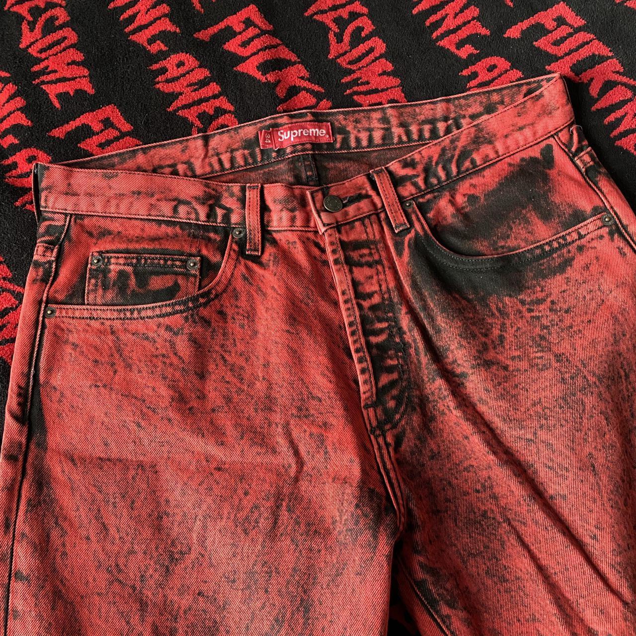 Supreme red denim jeans with paint wash look size 34