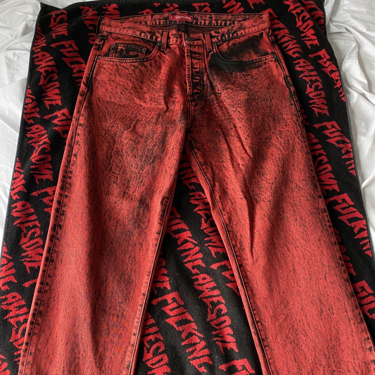 Supreme red denim jeans with paint wash look size 34