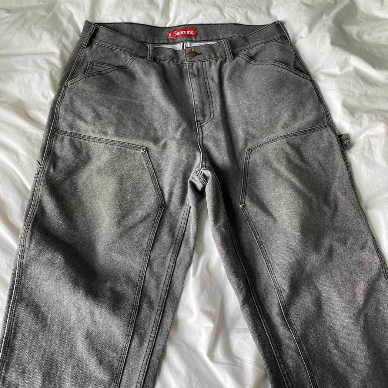 Supreme red denim jeans with paint wash look size 34