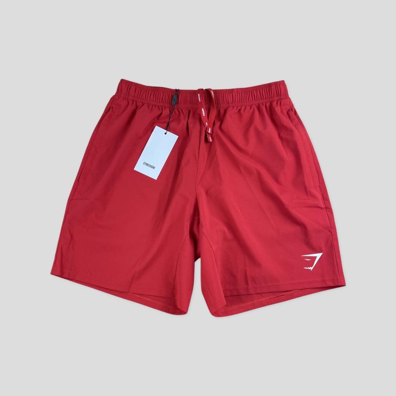 Gymshark arrival shorts red, zip pockets,... - Depop