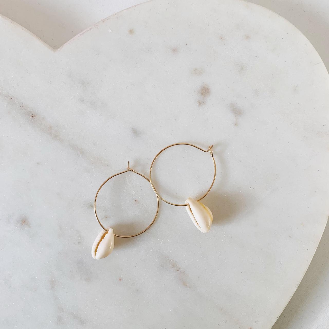 ‘isla’ a dainty gold hoop with an artificial... - Depop