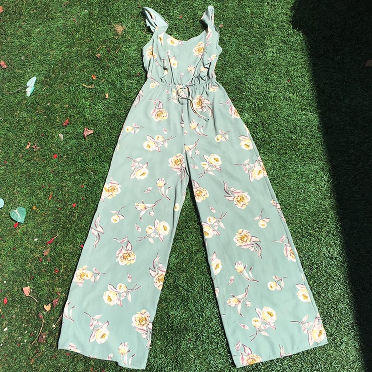 mint green floral jumpsuit lookin like a sweetie. Depop