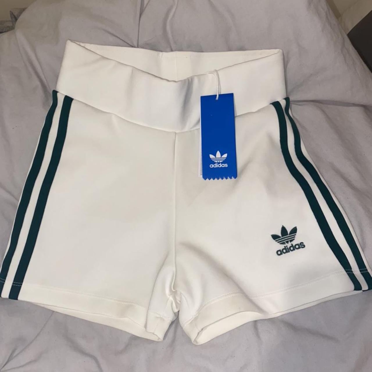 adidas cream and green shorts