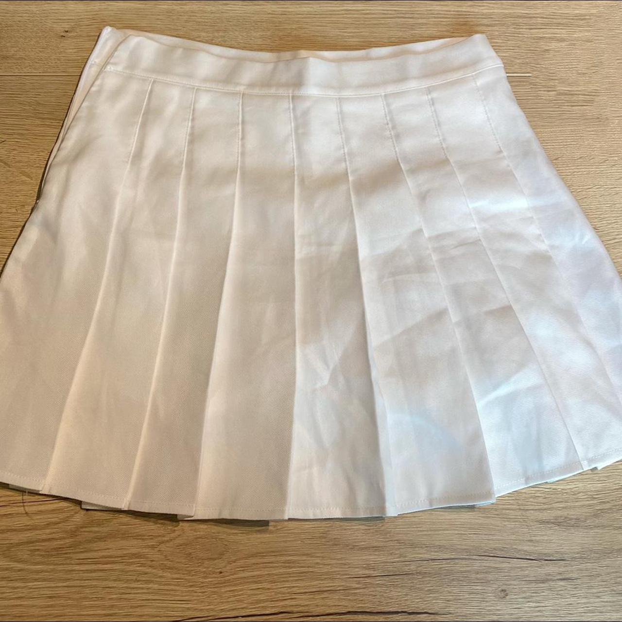 White mini pleated tennis skirt with shorts under🤍... - Depop