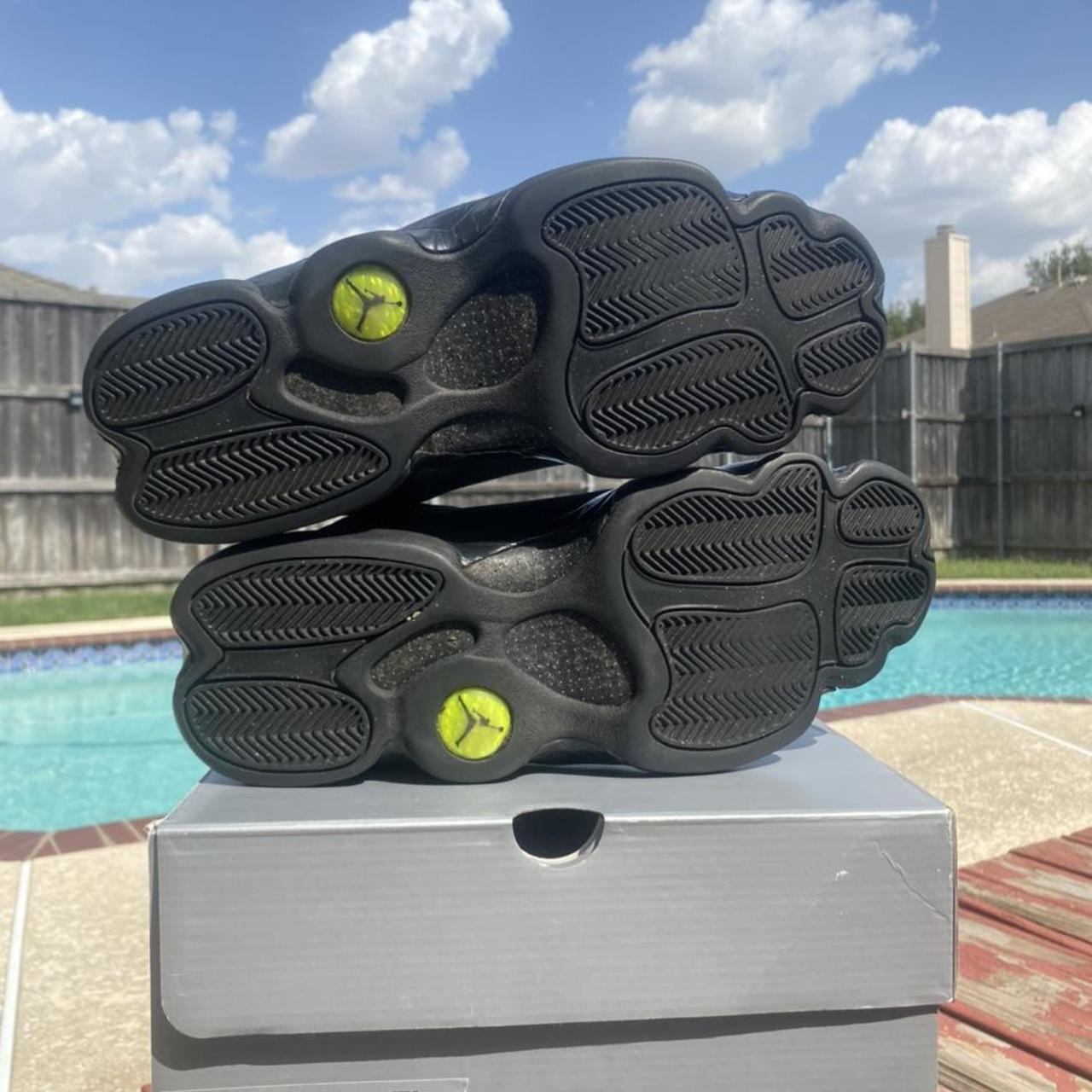 jordan 13 black yellow