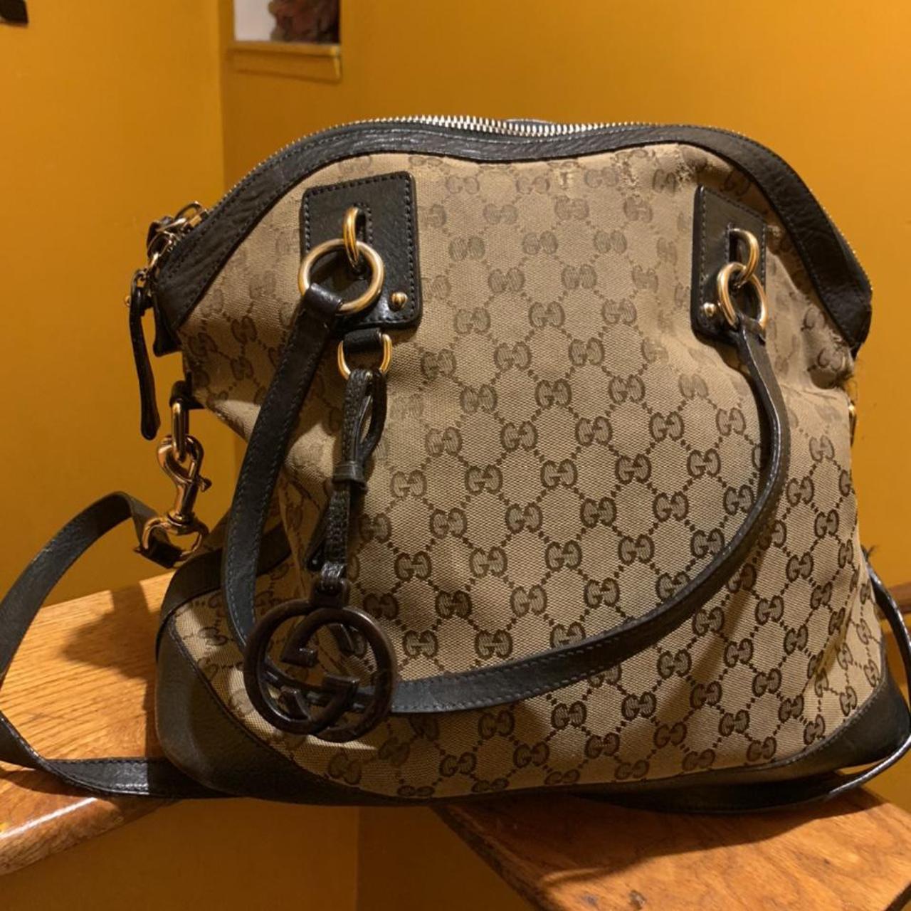 Gucci logo bag in black. Missing a tag on a zipper. - Depop