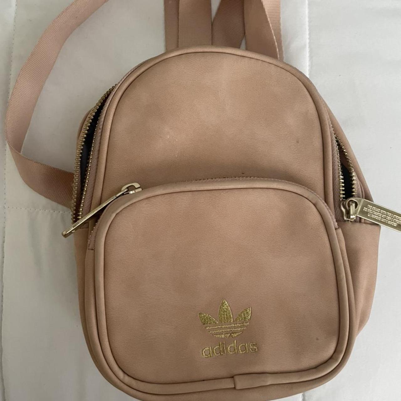 Adidas Mini rose gold backpack Does have flaws seen... Depop