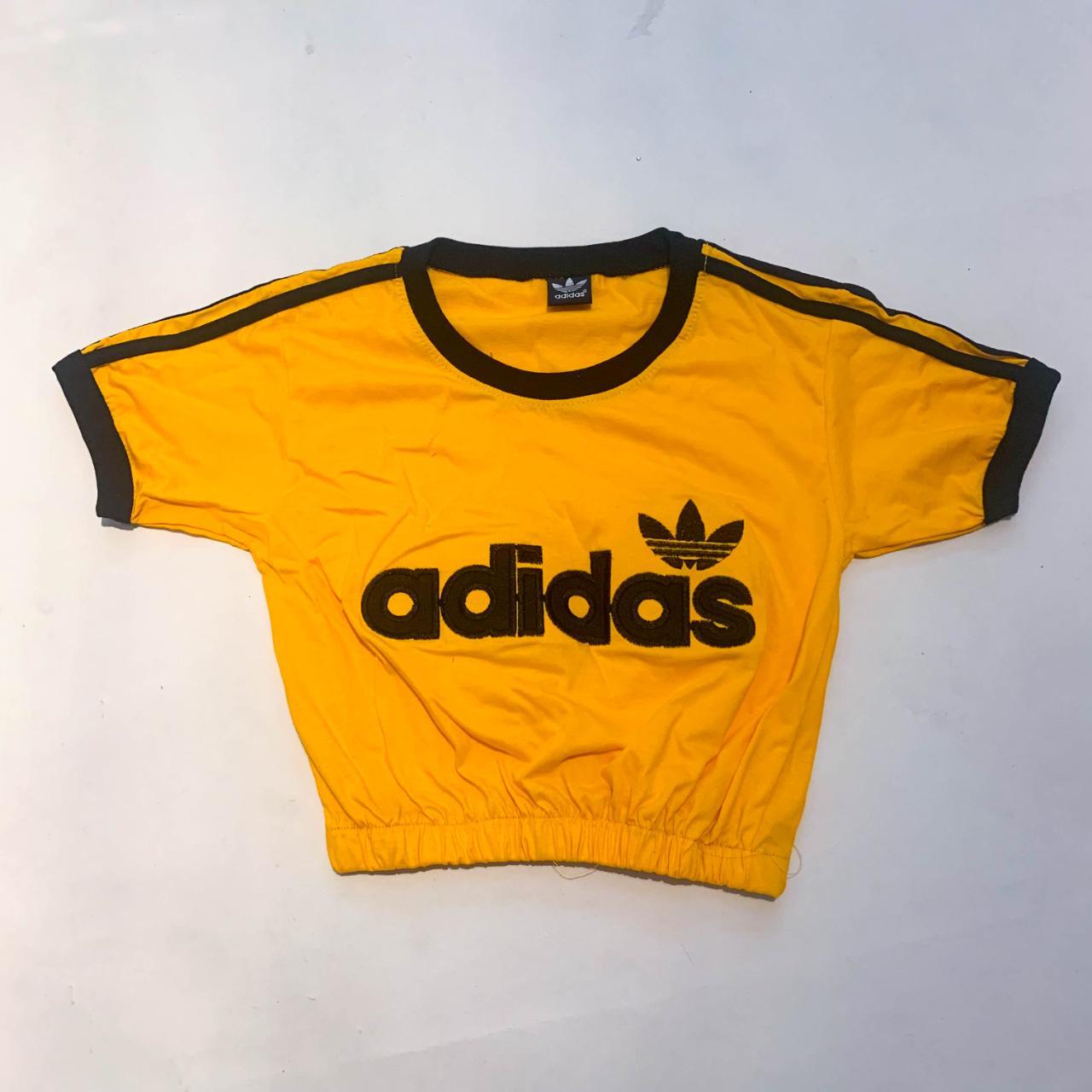 Adidas Women's Black and Yellow T-shirt | Depop