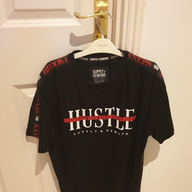 Supply and Demand gold and black joggers Depop