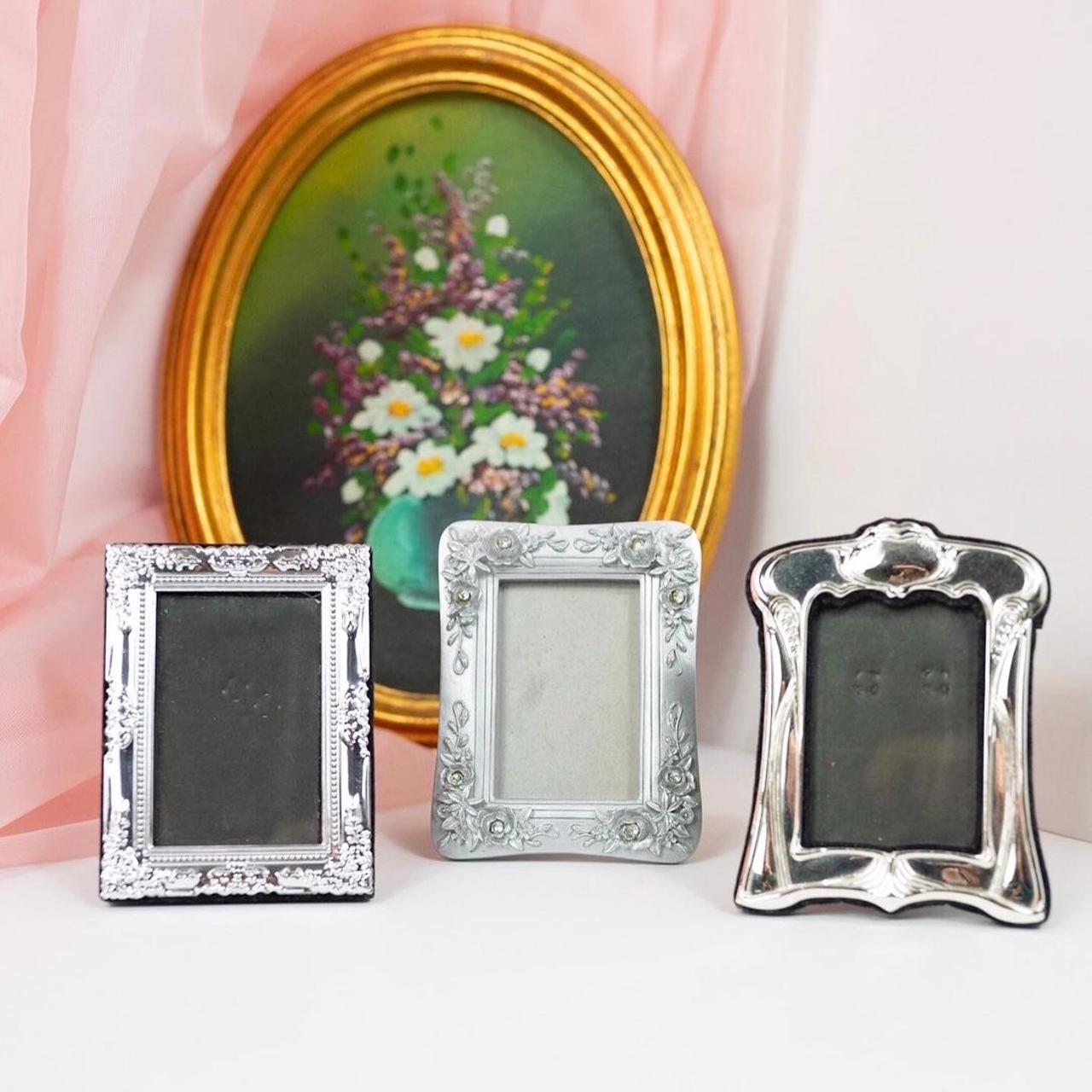 Mini silver tabletop frames each with different... Depop