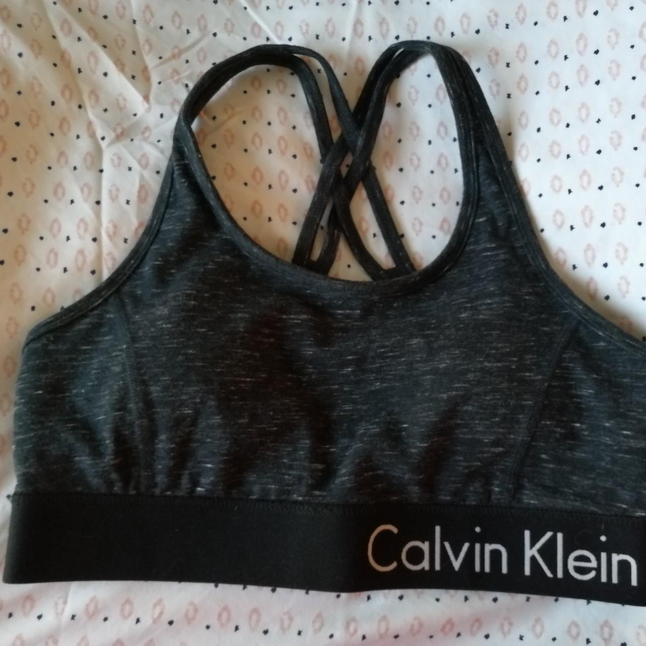 Calvin Klein sports bra no size tag, best fits - Depop