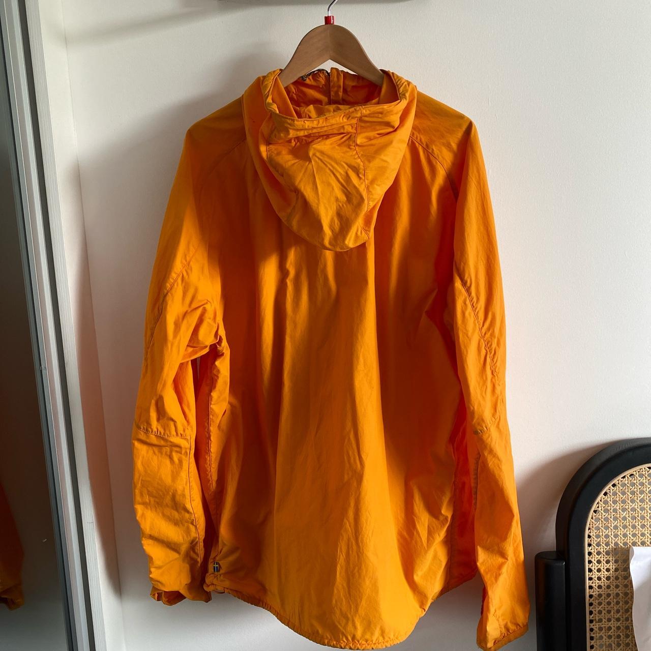 ORANGE LARGE FJALL RAVEN WATERPROOF JACKET. IN GREAT... Depop