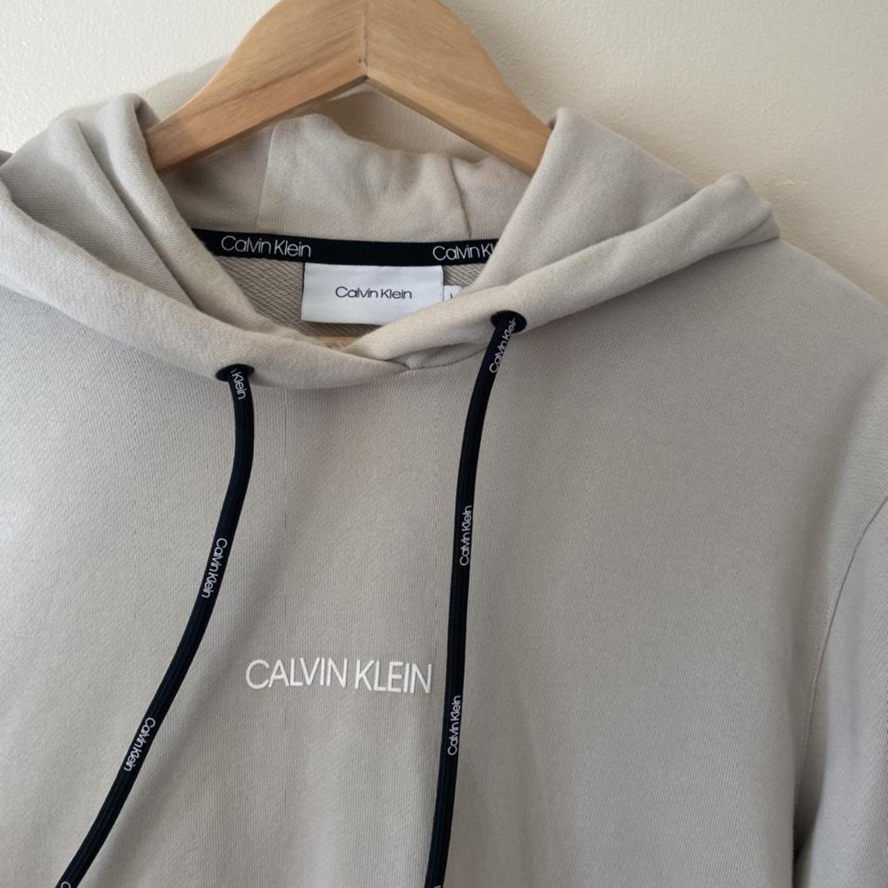 Calvin Klein Men's Cream and Tan Hoodie | Depop