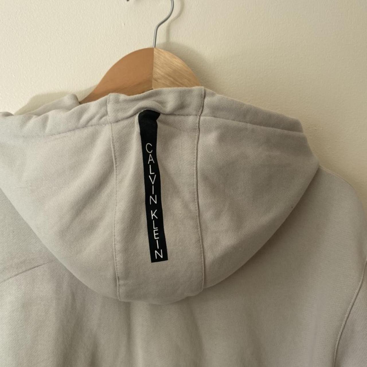 Calvin Klein Men's Cream and Tan Hoodie | Depop