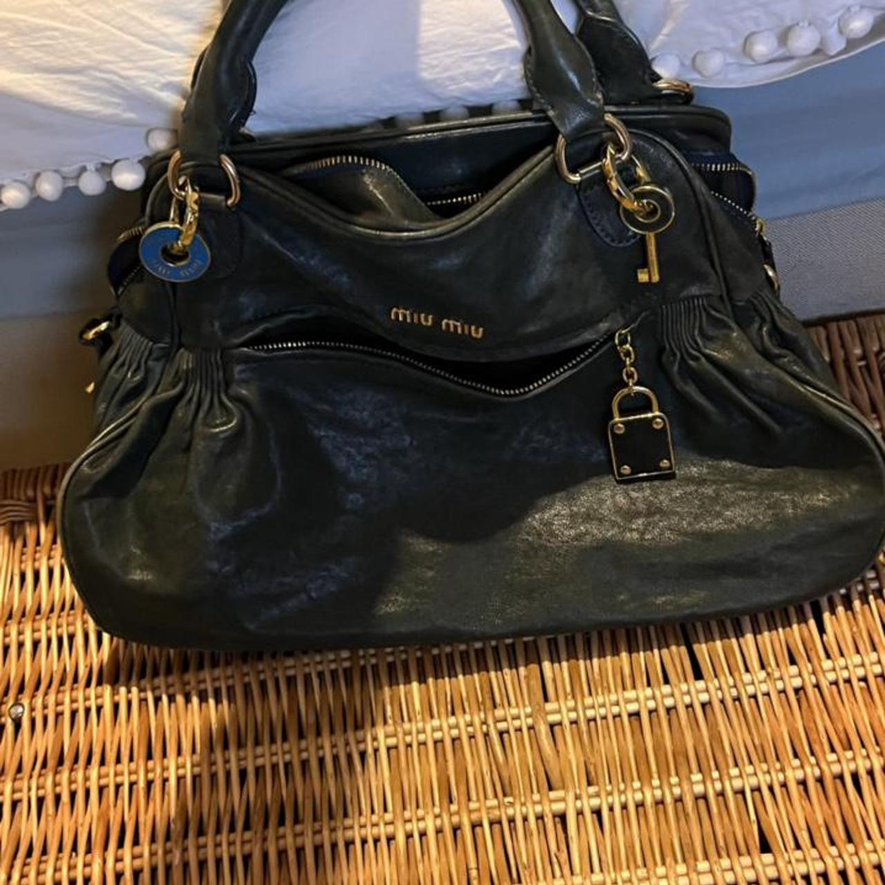 Miu Miu leather padlock bag. Excellent condition | Depop Miu Miu leather padlock bag. Excellent condition | Depop