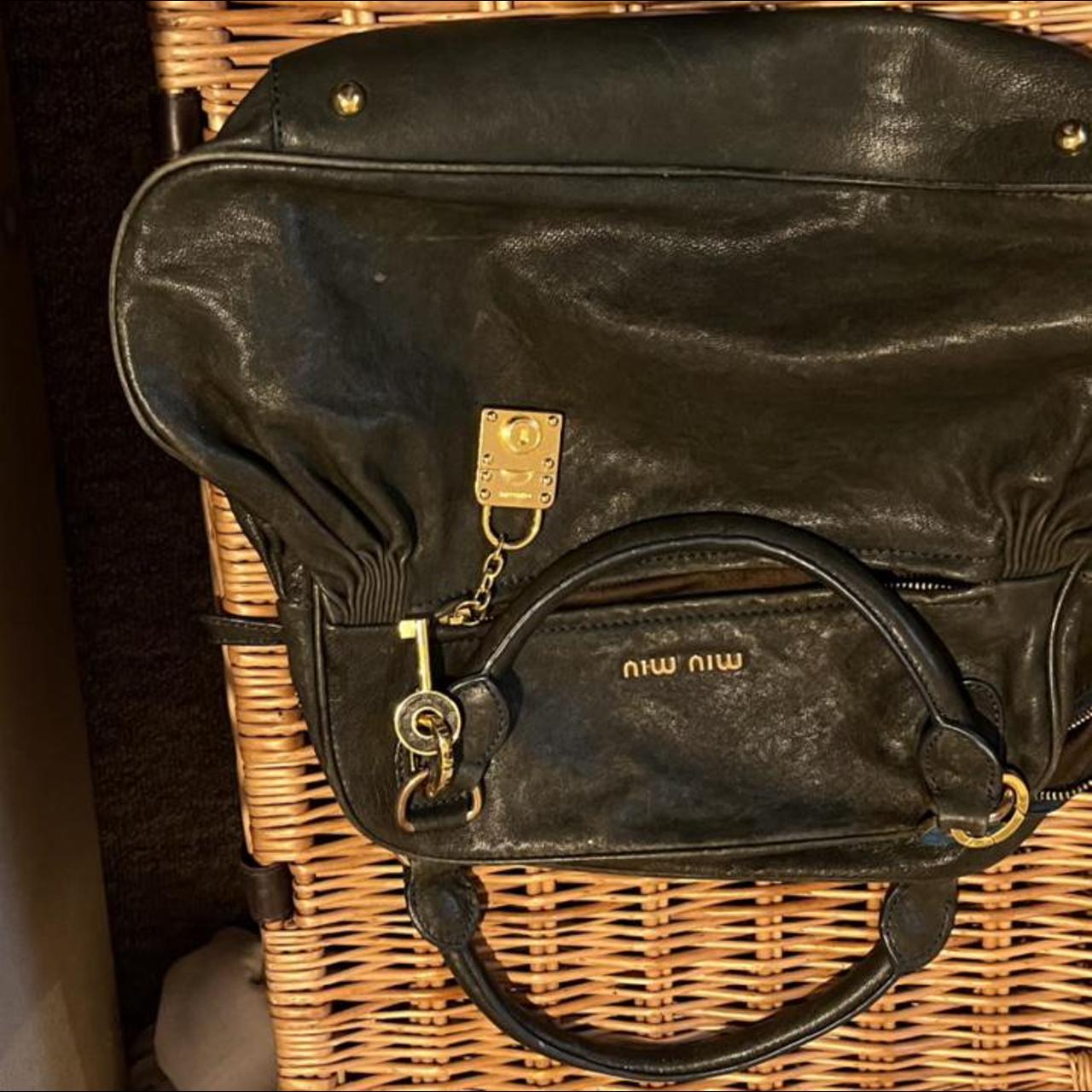 Miu Miu leather padlock bag. Excellent condition | Depop Miu Miu leather padlock bag. Excellent condition | Depop