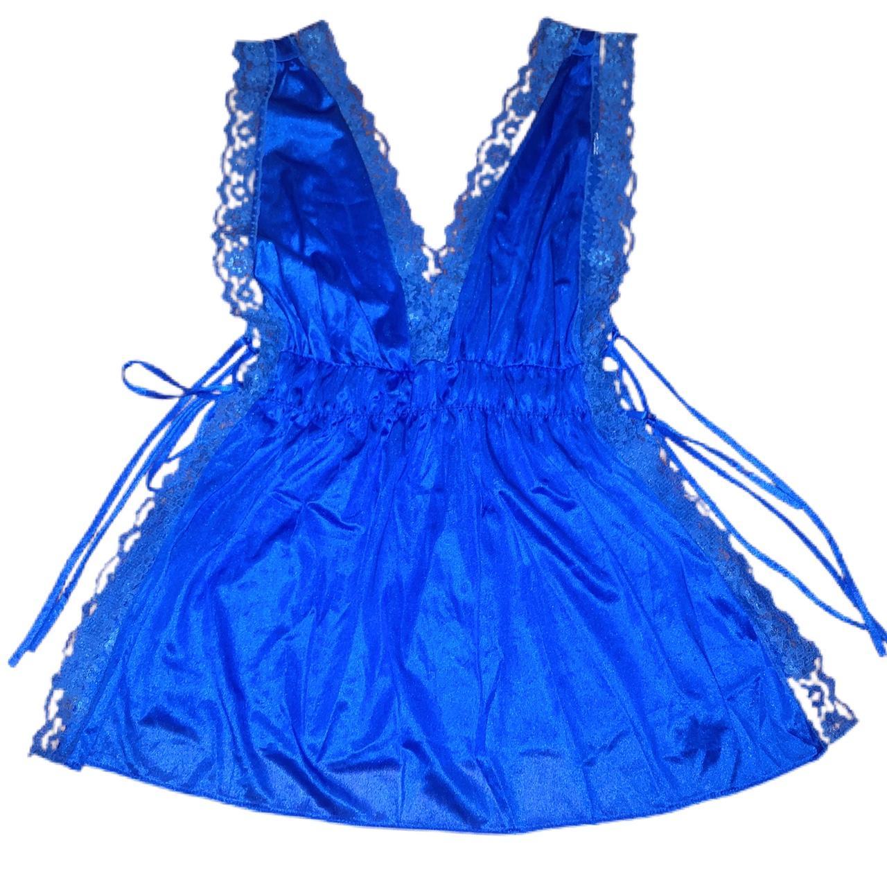Electric blue lace slip shirt with side cut outs... Depop