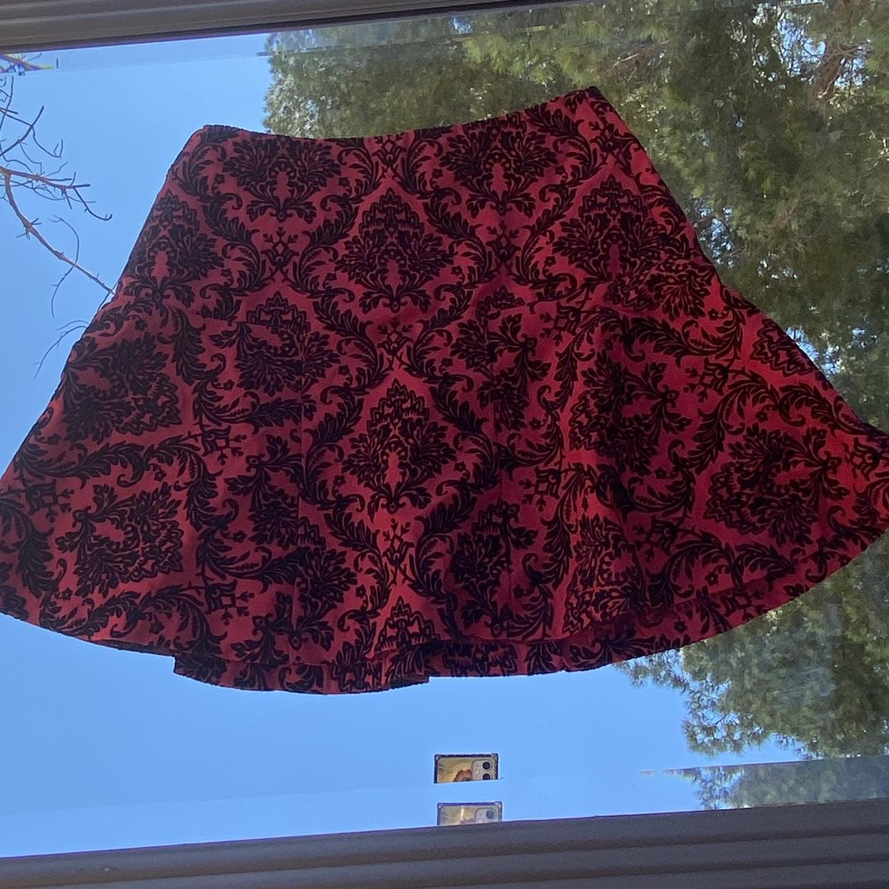 red and black skirt from forever 21 . i think it’s... Depop
