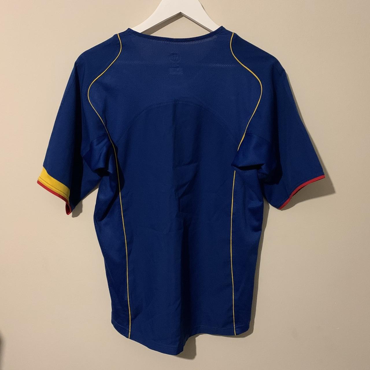 arsenal blue o2 shirt