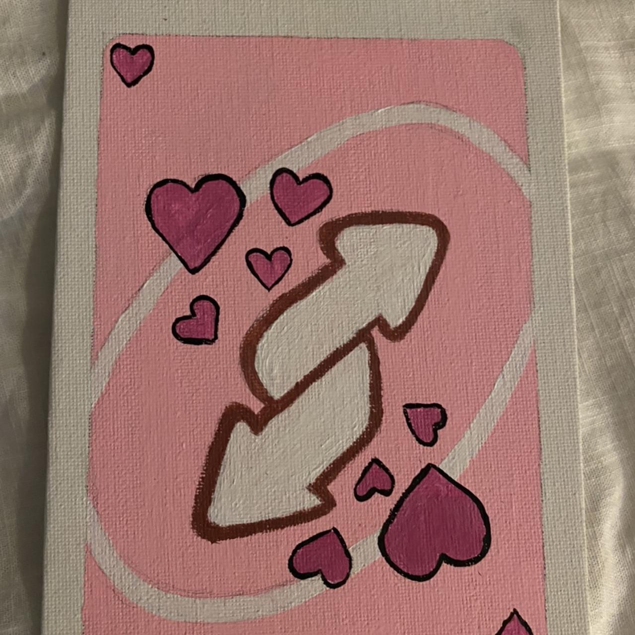 Pink Uno reverse card