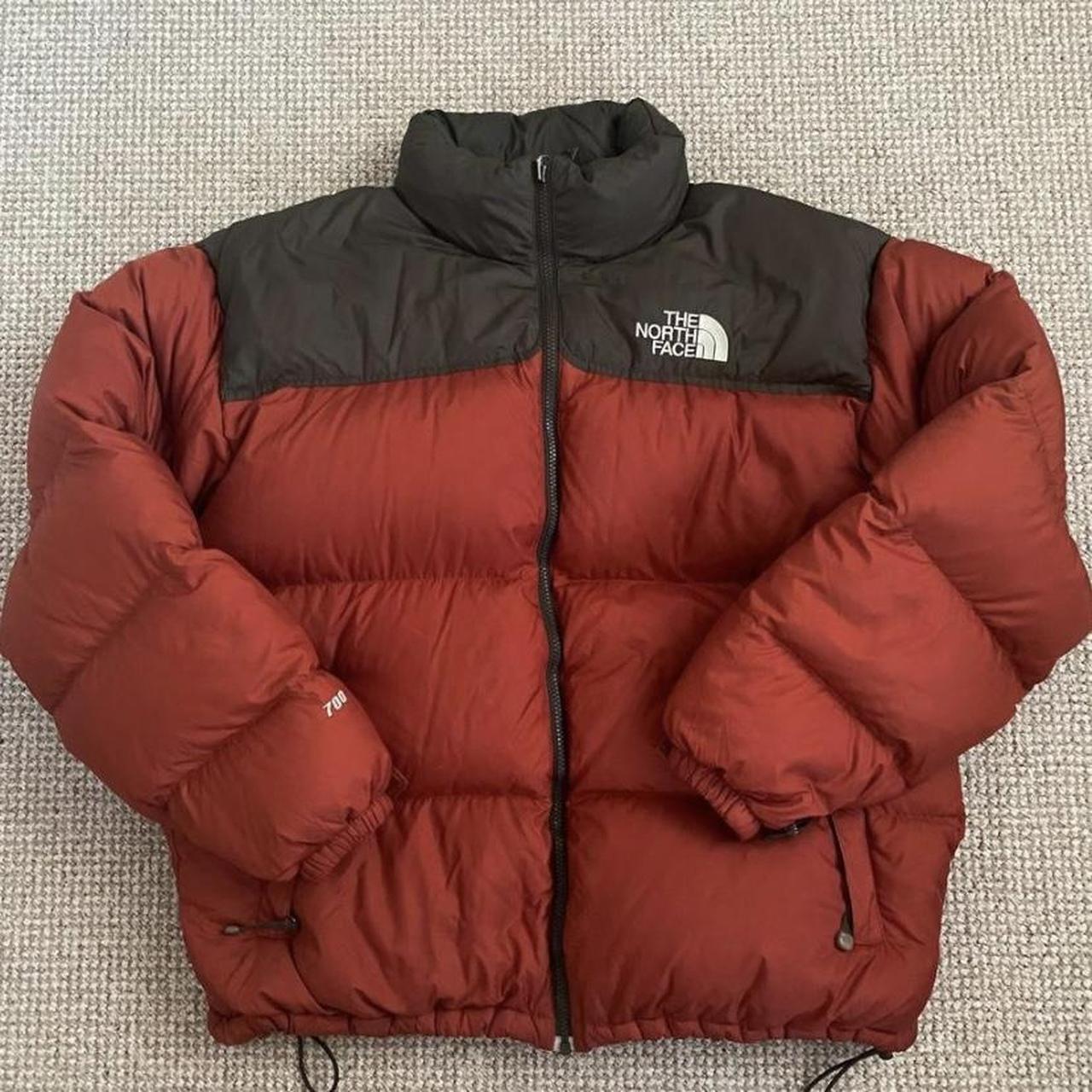 north face burnt orange jacket