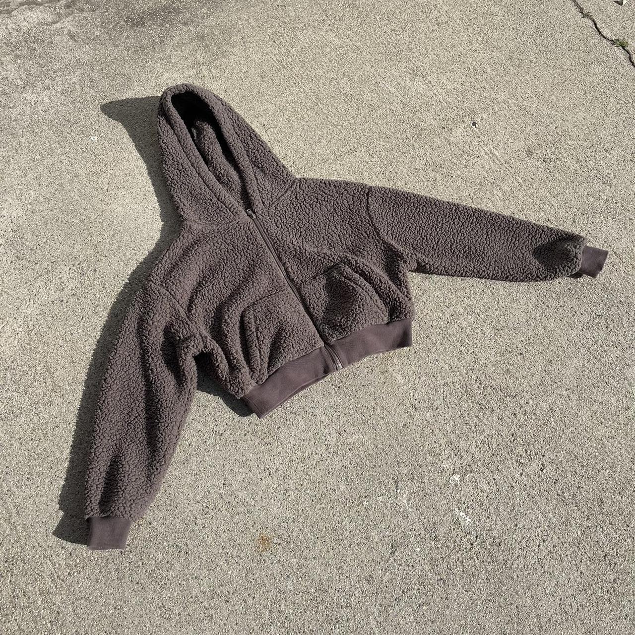 fuzzy zip up sweater