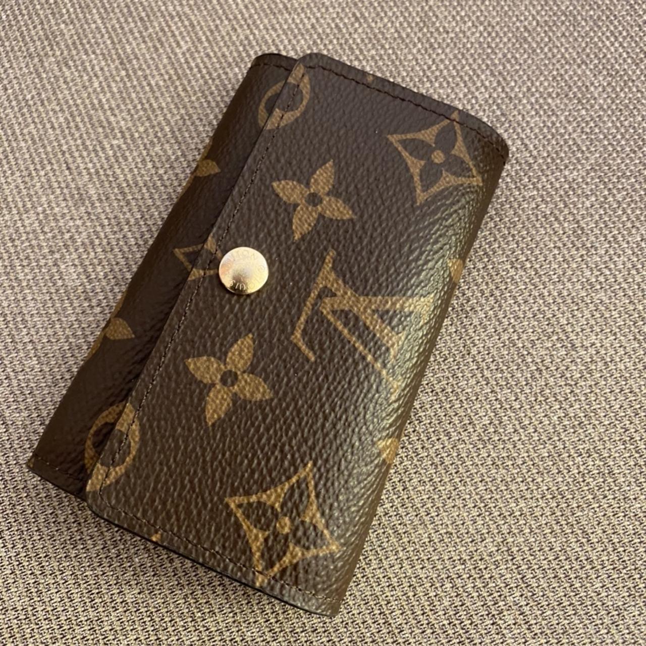 Louis Vuitton Key Holder in brown leather with LV - Depop