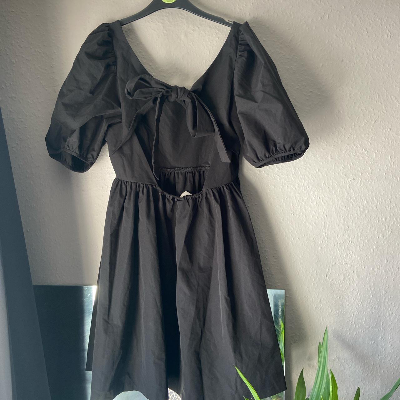 H&M trend black mini dress with tie back worn once... - Depop