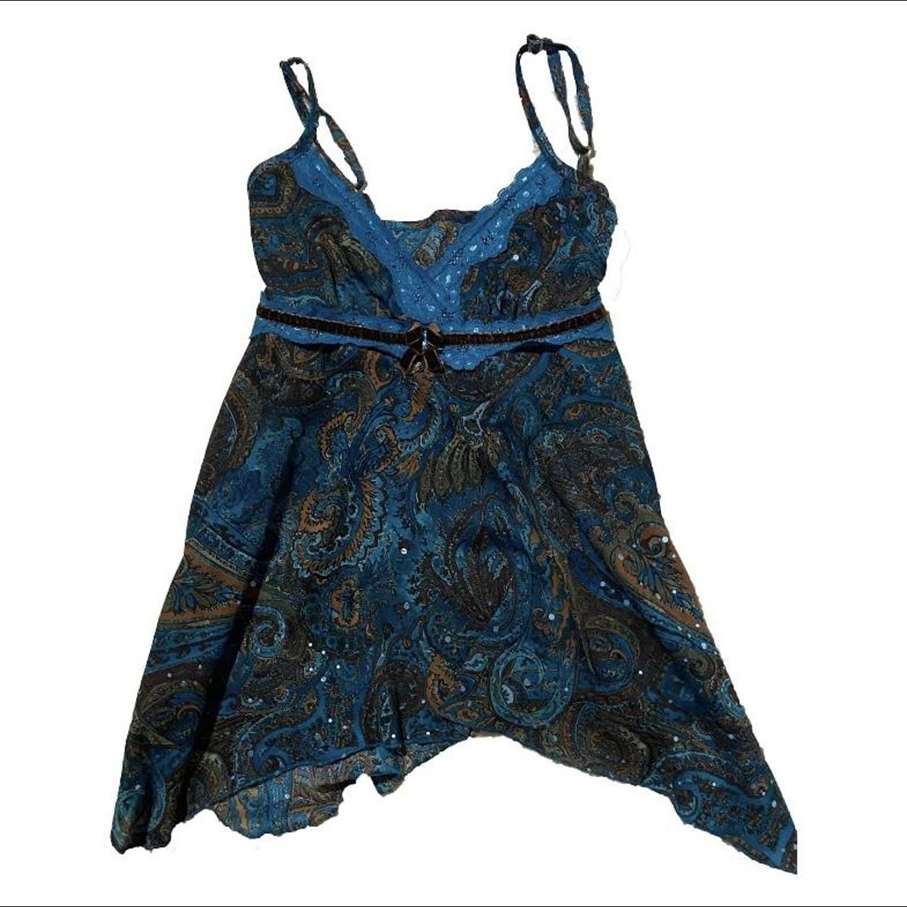 y2k tank top with tie strings on the back. The color... Depop