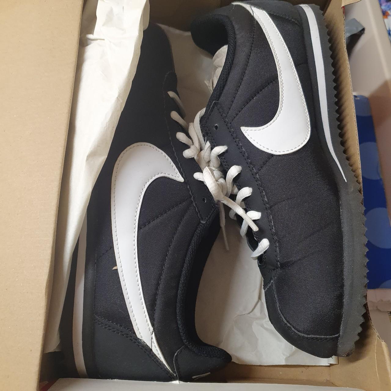 Nike cortez black and white, worn once, in good... - Depop
