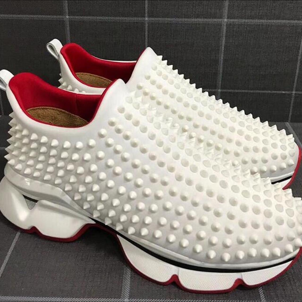 Christian louboutins red suede spiked flatbottom. - Depop