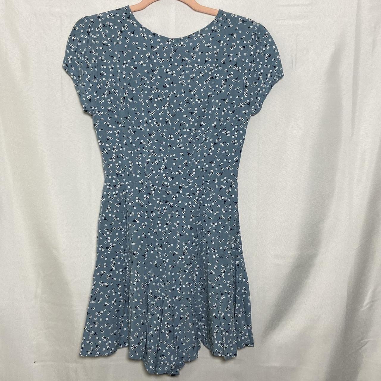 Garage Women's Blue and White Playsuitromper Depop