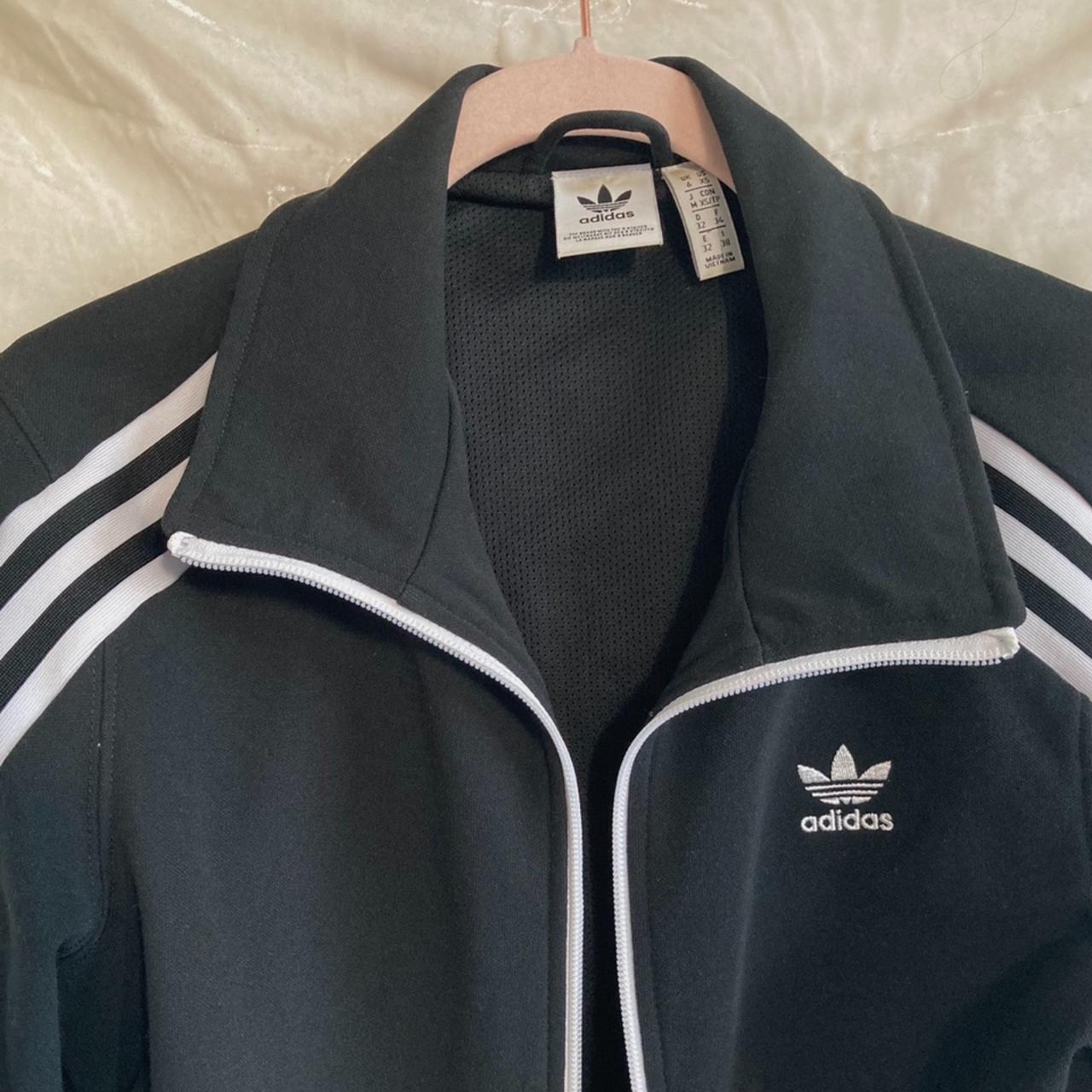Sporty cropped Adidas jacket. Has a super cool... - Depop